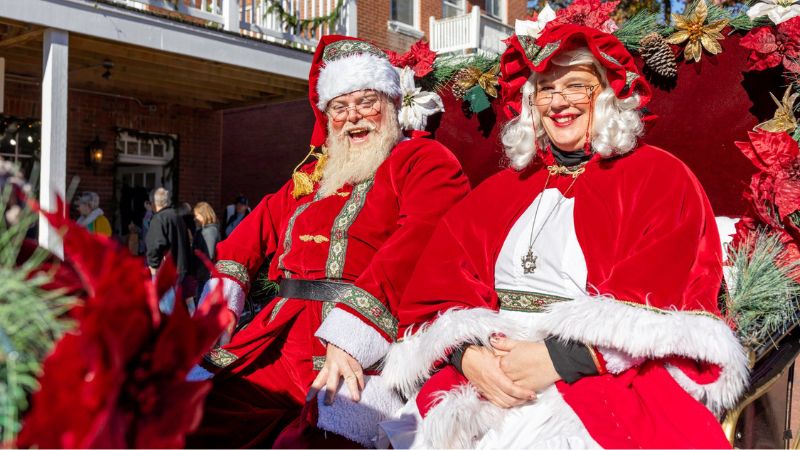 Santa Claus and Mrs. Claus entertain at St. Charles Christmas Traditions