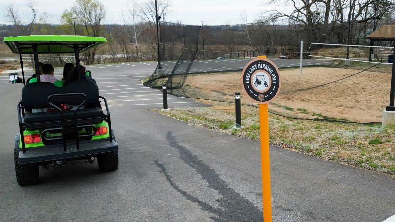 Golf cart parking area next to Frankie Martin’s Garden